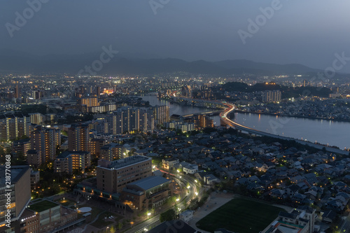 Night Landscape of Expressway across the river at fukuoka Fukuoka city in summer day.