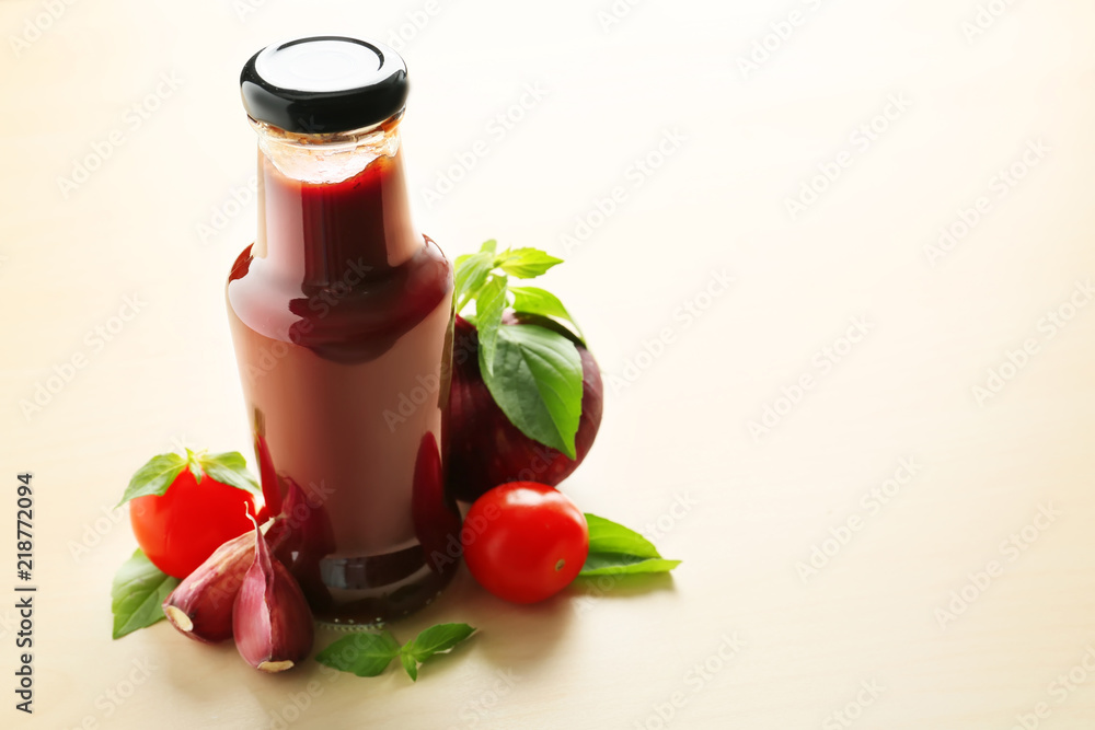 Bottle with tasty barbecue sauce on table Bottle with tasty barbecue sauce on table