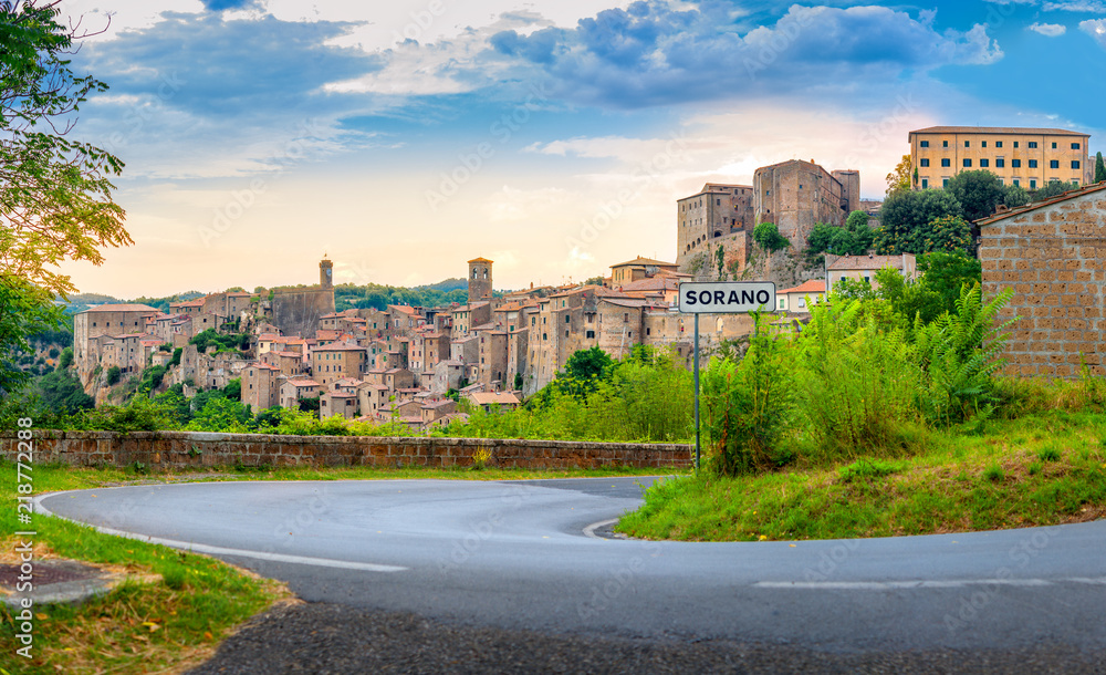 Panorama of the picturesque medieval village of Sorano located on a hill at sunset, Tuscany. Italy