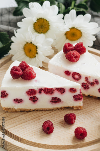 pieces of delicious cake with raspberries, sweet dessert