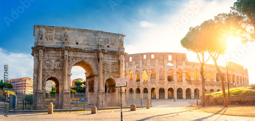 Panorama of the Arch of Constantine and the Colosseum in the morning sun. Rome architecture and landmark, Italy. Europe photo