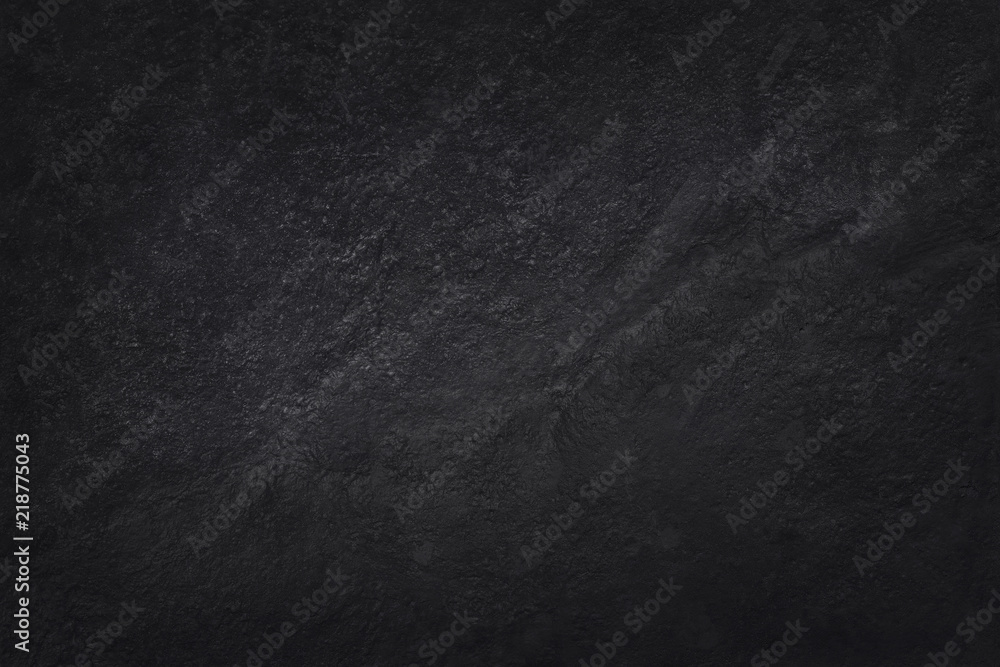 Fototapeta premium Dark grey black slate texture in natural pattern with high resolution for background and design art work. Black stone wall.