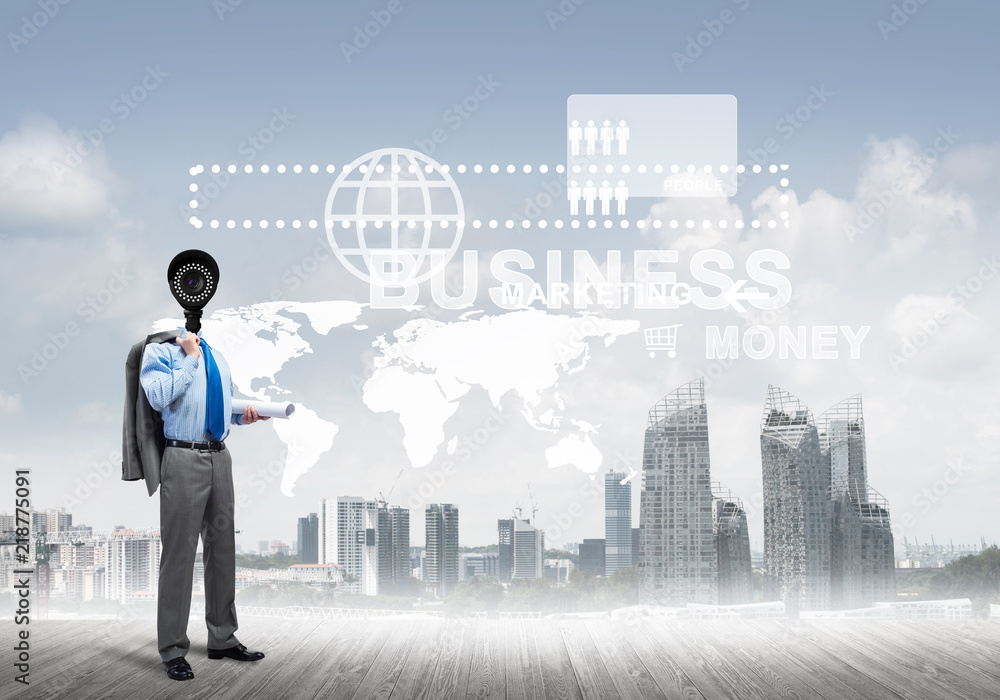 Camera headed man standing on wooden floor against modern cityscape Camera headed man standing on wooden floor against modern cityscape