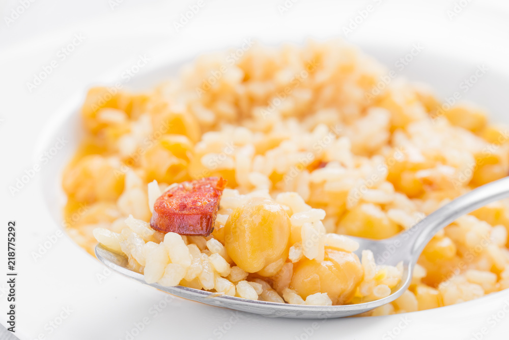 dish of homemade chickpeas on white wooden board dish of homemade chickpeas on white wooden board