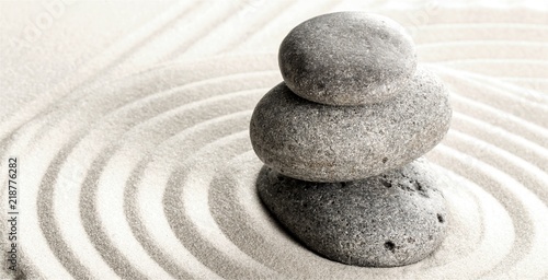 Zen stones on the sand