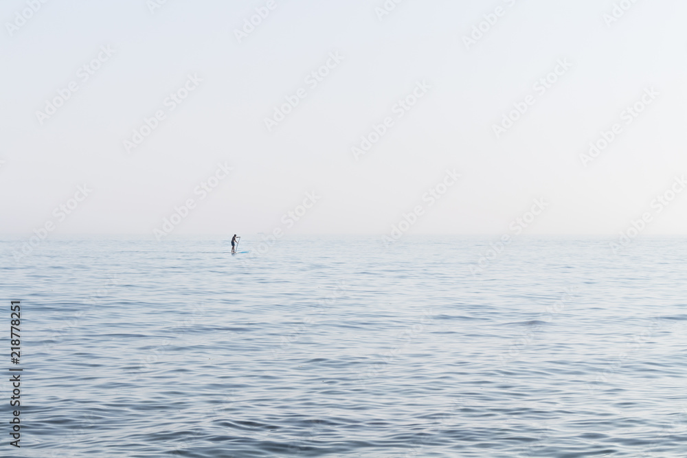 Stand Up Paddler on the open Sea
