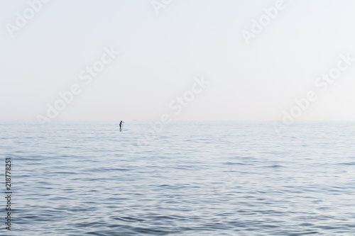 Stand Up Paddler on the open Sea