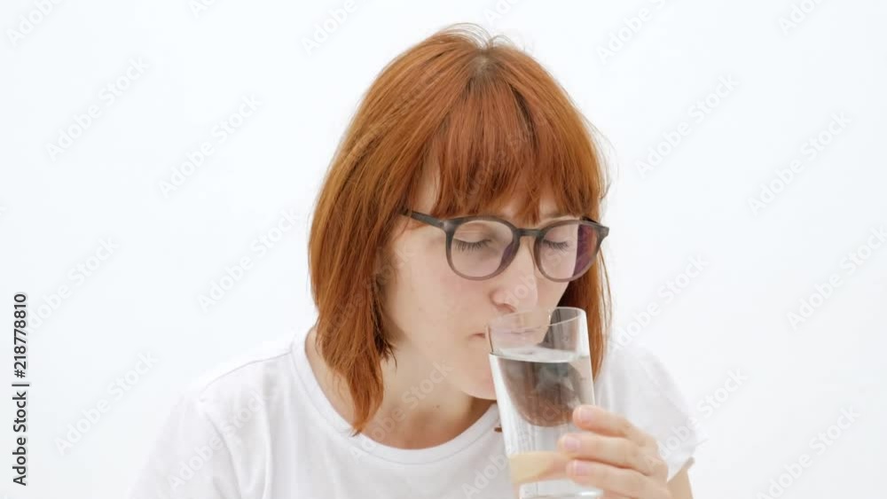 Woman fingering pills in her hand. Young girl taking medicaments Woman fingering pills in her hand. Young girl taking medicaments