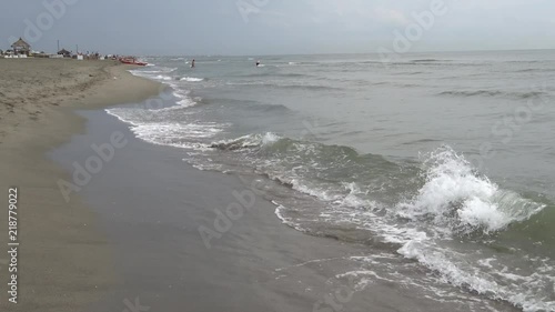 Seawater flowing away from shore photo