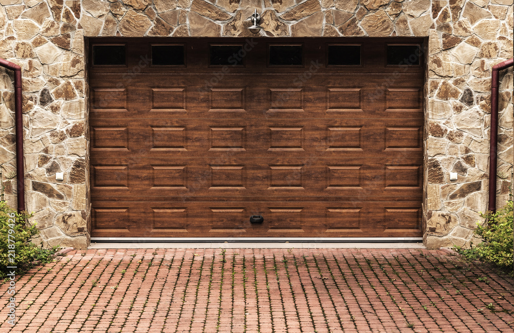 Automatic garage door close-up. Entrance to the garage.
