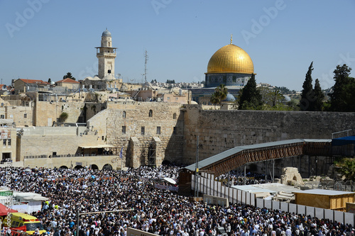 Religious Jews pray at the Western Wall in Jerusalem. Prayer of the Coens in honor of the Jewish holiday Pesach photo