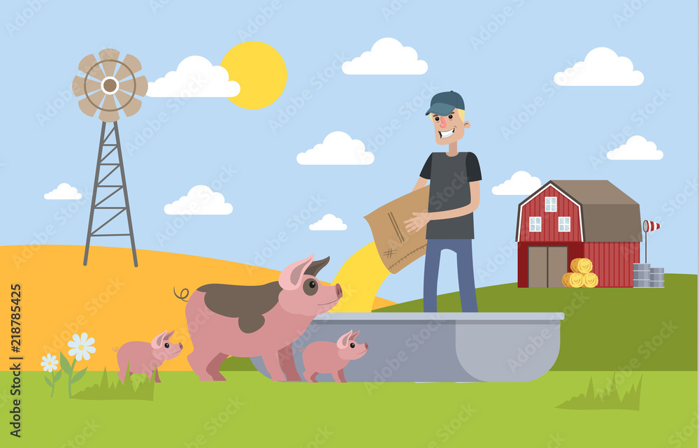 Smiling male farmer feeding pig on the farm