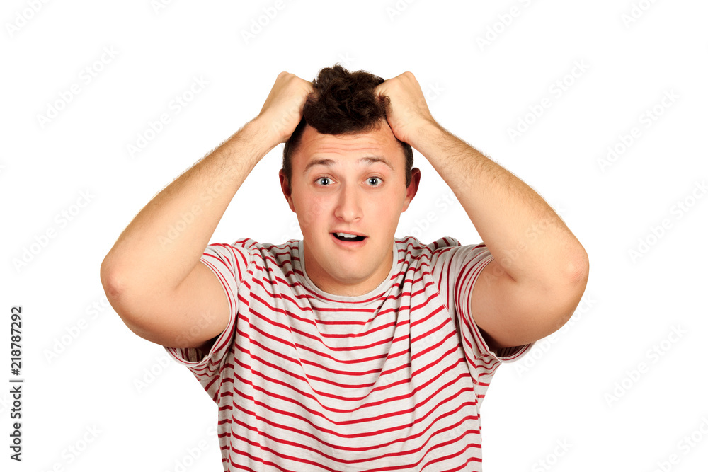 Portrait of a confused bearded man holding hands on his head. emotional guy isolated on white background Portrait of a confused bearded man holding hands on his head. emotional guy isolated on white background