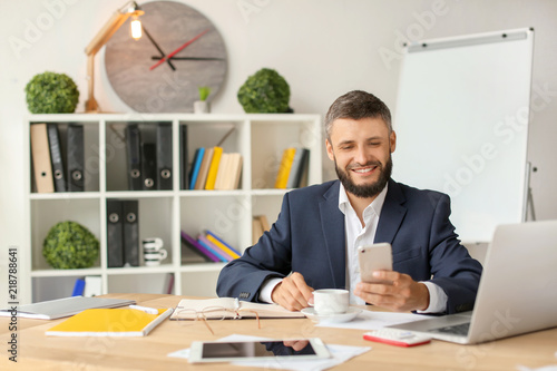 Businessman with cup of cof...