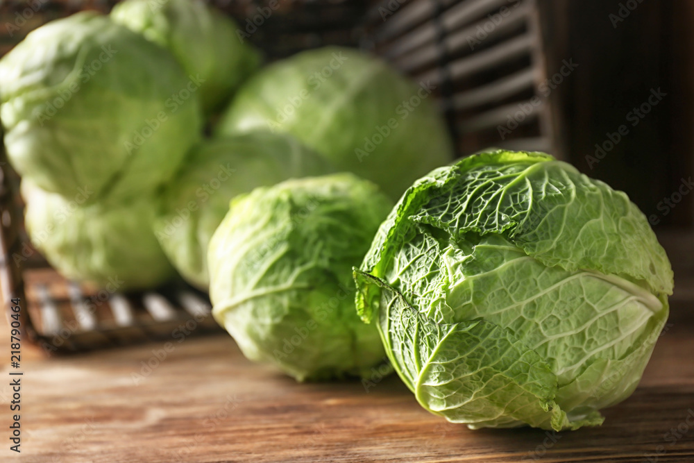 Fototapeta premium Fresh cabbage on wooden table