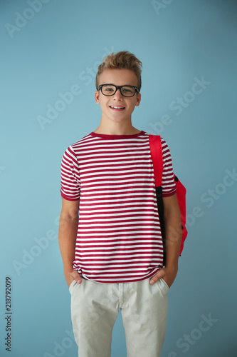 Teenage boy with backpack o...