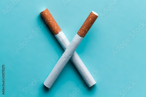 Smoking concept, stop smoking concept. Cigarettes on a blue background.