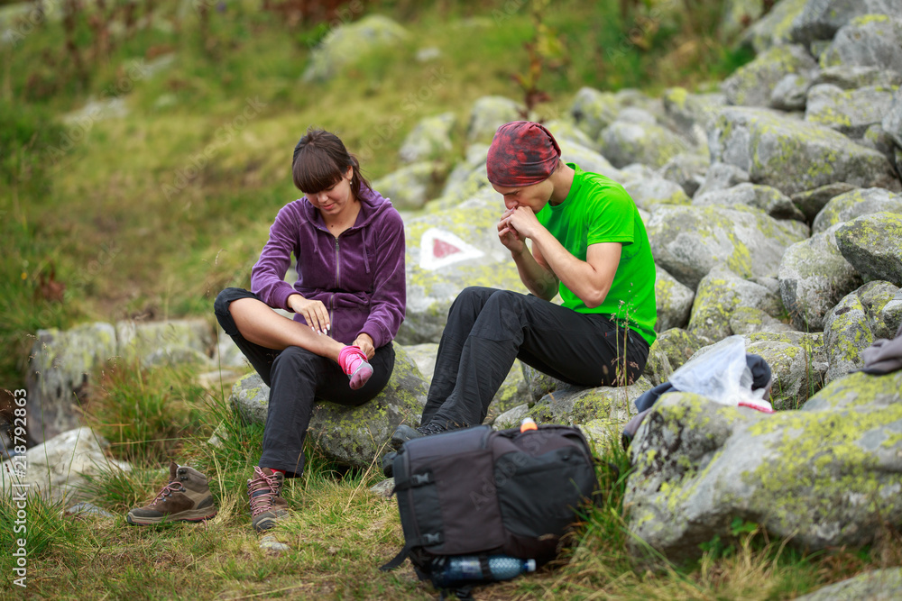 Couple of hikers resting