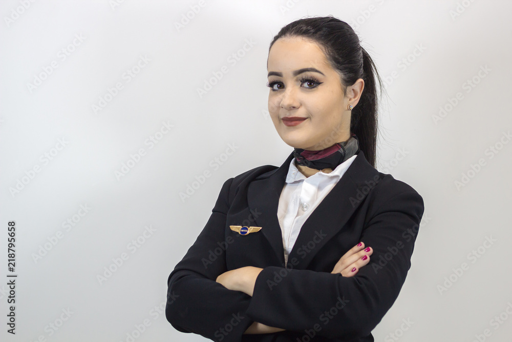 Beautiful stewardess. Studio shot with fly attendant woman. Beautiful stewardess. Studio shot with fly attendant woman.