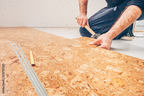 Master class for laying cork flooring, installation of a cork floor by a floating method, connection of a series of cork flooring photo