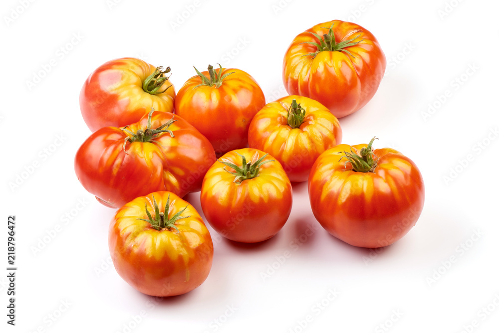 Fresh colorful sweet rustic tomatoes, isolated on white background. Fresh colorful sweet rustic tomatoes, isolated on white background.