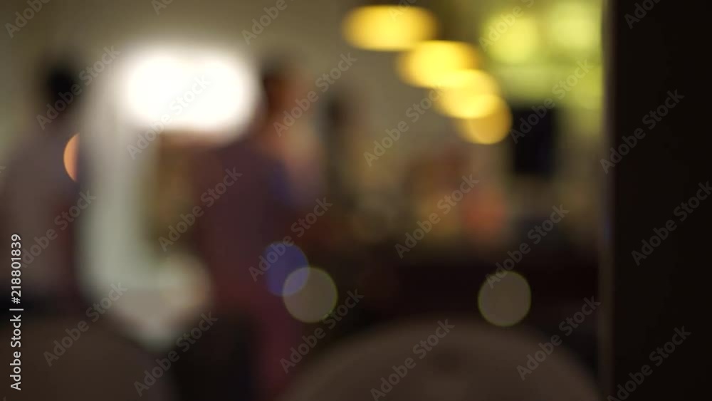 Abstract blurred background with people in bar, restaurant, cafeteria or pub. Lights and bokeh. Abstract blurred background with people in bar, restaurant, cafeteria or pub. Lights and bokeh.