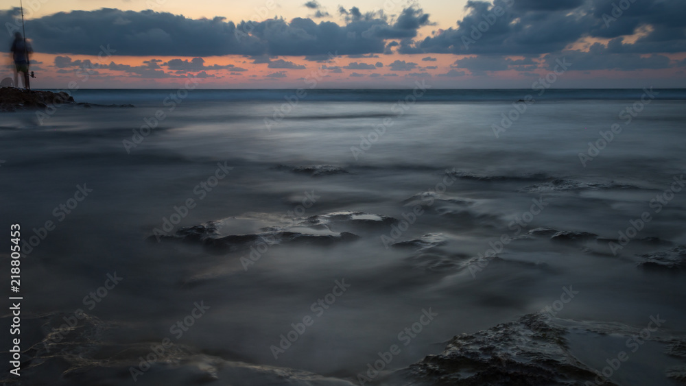 Long exposure sunset on Palmahim rocky Beach- Israel