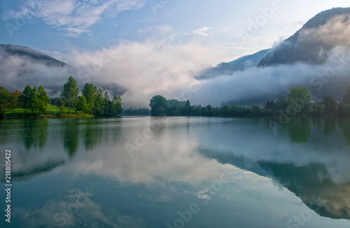 Cuadro en lienzo Amazing view of reservoir on Soca river near Most na Soci, Slovenia at foggy mor