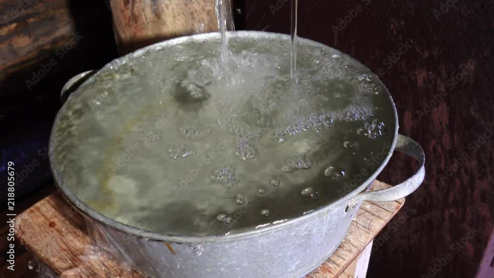 Russian sauna. Water is poured into the aluminum pelvis. Russian sauna. Water is poured into the aluminum pelvis.