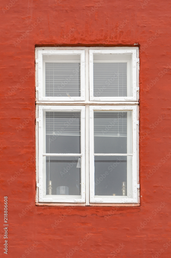 Window on the colorful facade