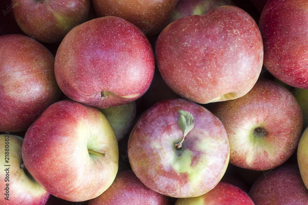 Pile of ripe red apples closeup. Natural background Pile of ripe red apples closeup. Natural background