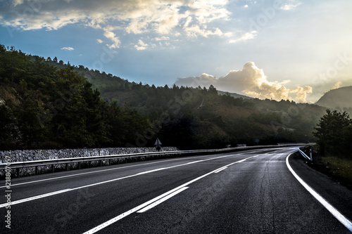 road, highway, sky, asphalt, landscape, travel, nature, mountain, blue, way, speed, clouds, cloud, country, summer, transportation, forest, mountains, transport, rural, line, journey, empty, horizon, 