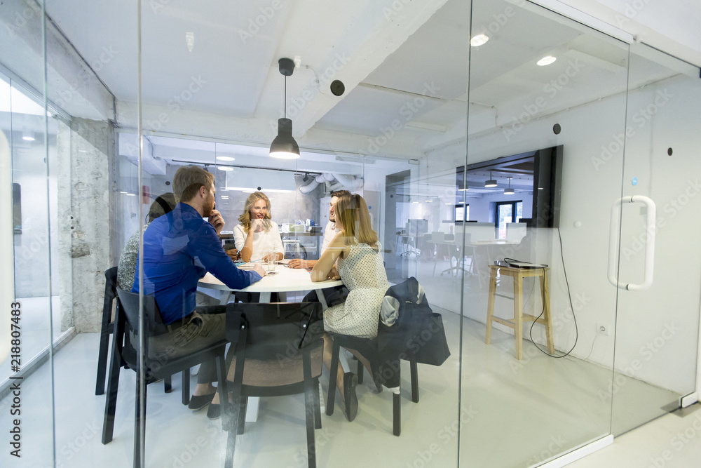 Modern business team developing the company's strategy at the office