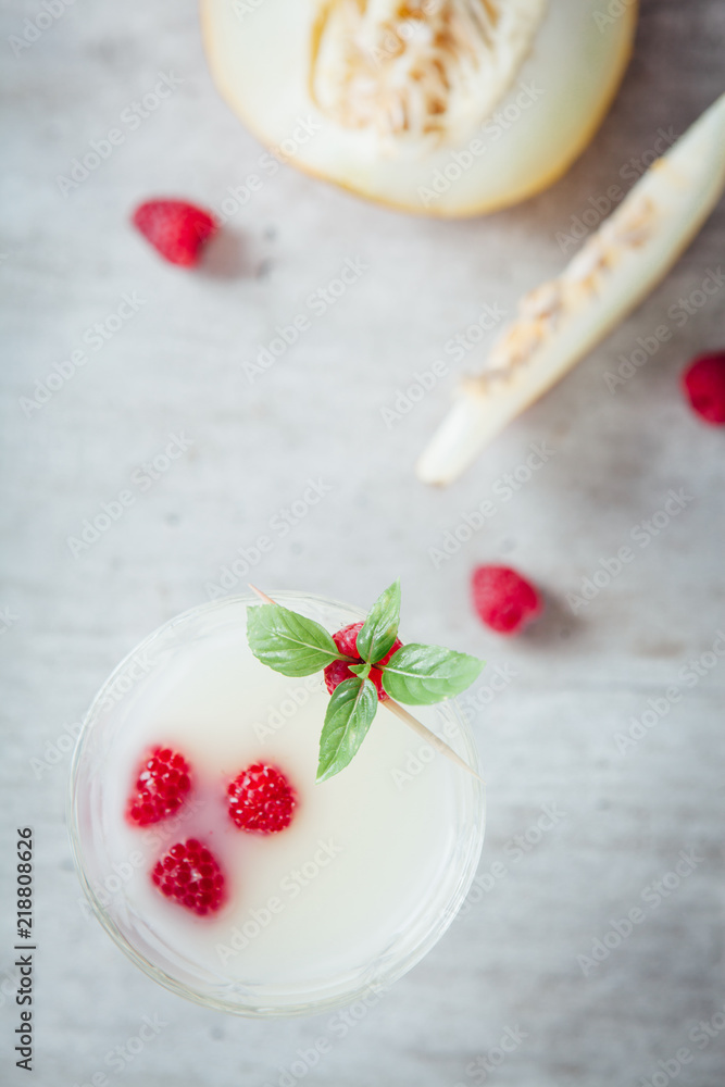 Cocktail of melon with raspberries. Pieces of melon. Cocktail of melon with raspberries. Pieces of melon.