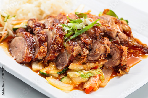 Roasted meat with  rice. Korean cuisine.