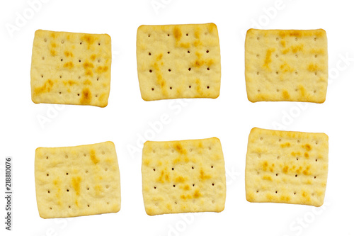 six roasted biscuits of uneven shape without sugar isolated on white background
