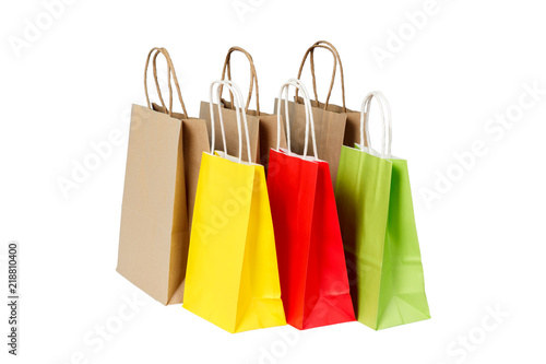 Set of colored and brown paper shopping bags isolated
