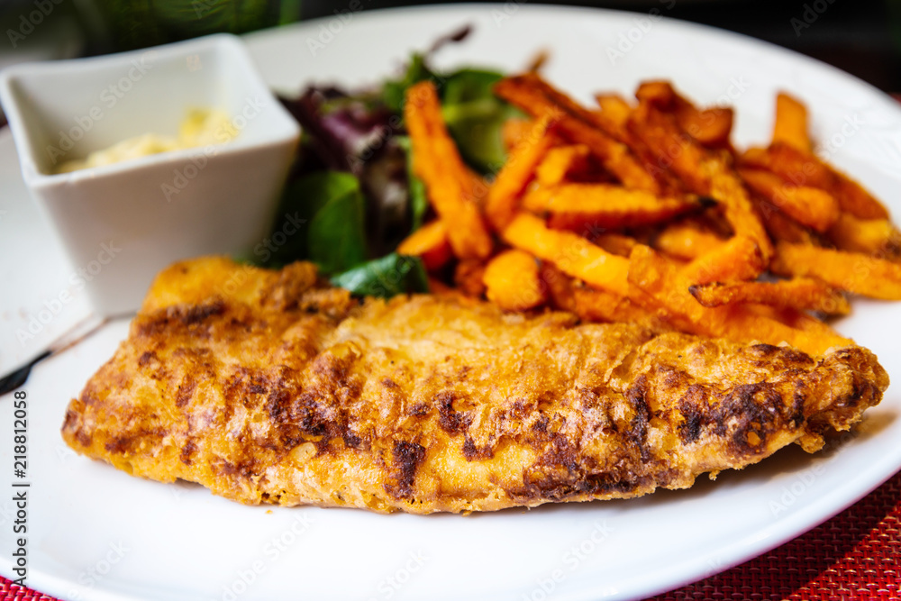 British Traditional fish and chips and tartar sauce British Traditional fish and chips and tartar sauce