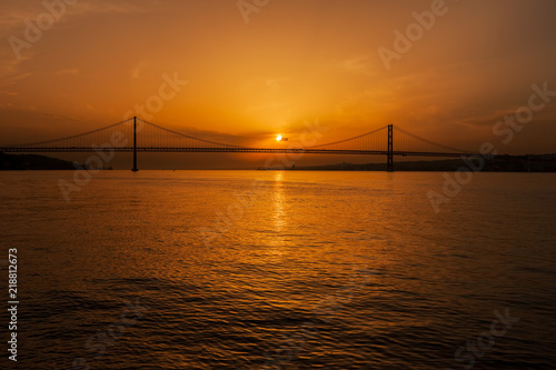 5th of April Bridge on Tagus River at Sunset in Portugal