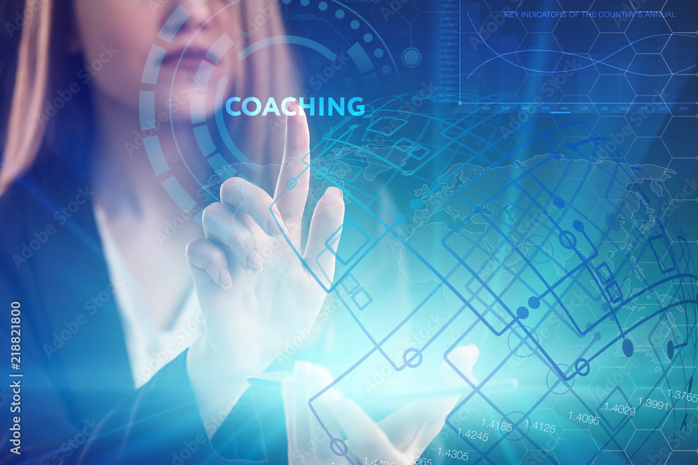 The concept of business, technology, the Internet and the network. A young entrepreneur working on a virtual screen of the future and sees the inscription: coaching The concept of business, technology, the Internet and the network. A young entrepreneur working on a virtual screen of the future and sees the inscription: coaching