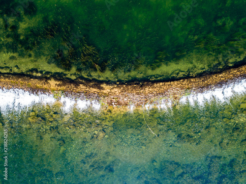 Aerial view from above of stream waterfall on river Dobra, Croatia