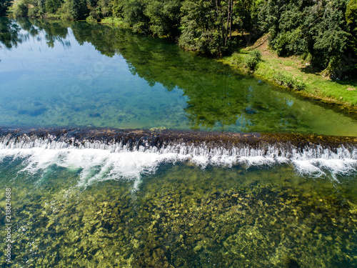 Aerial view of stream waterfall on river Dobra, Croatia