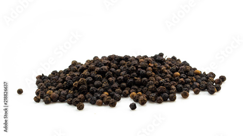 Black peppers isolated on white background.