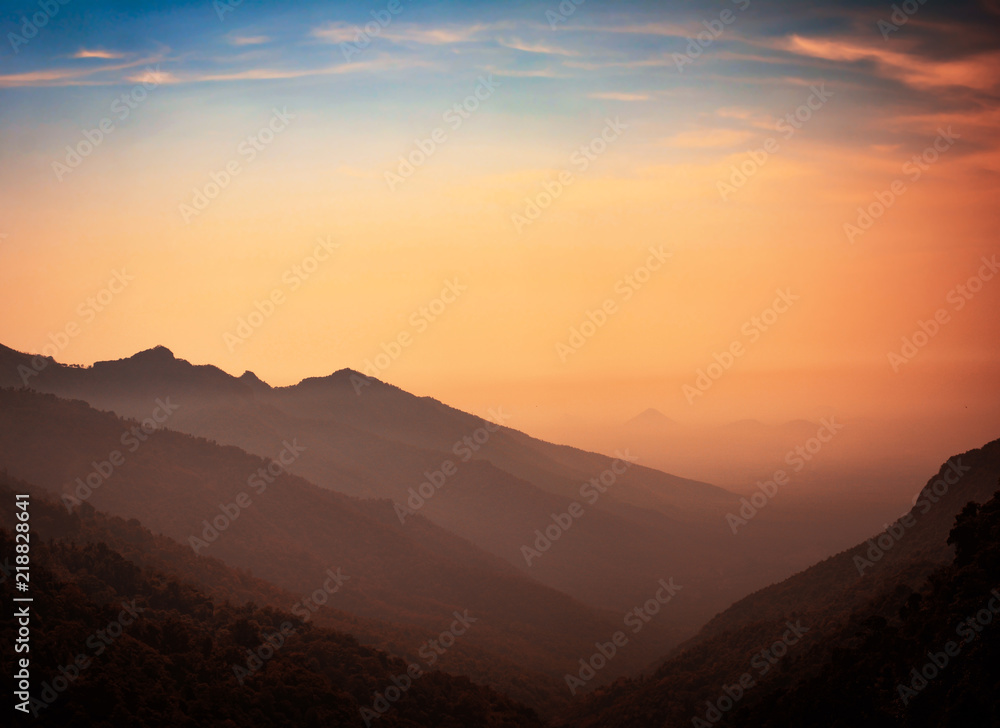 Majestic scene of silhouettes of mountains