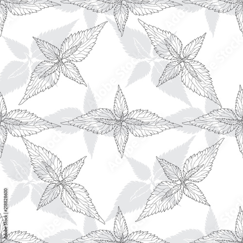 Monochrome floral pattern with leaves of nettle on white background. Seamless background.