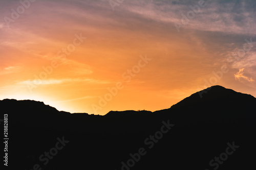Majestic scene of silhouettes of mountains
