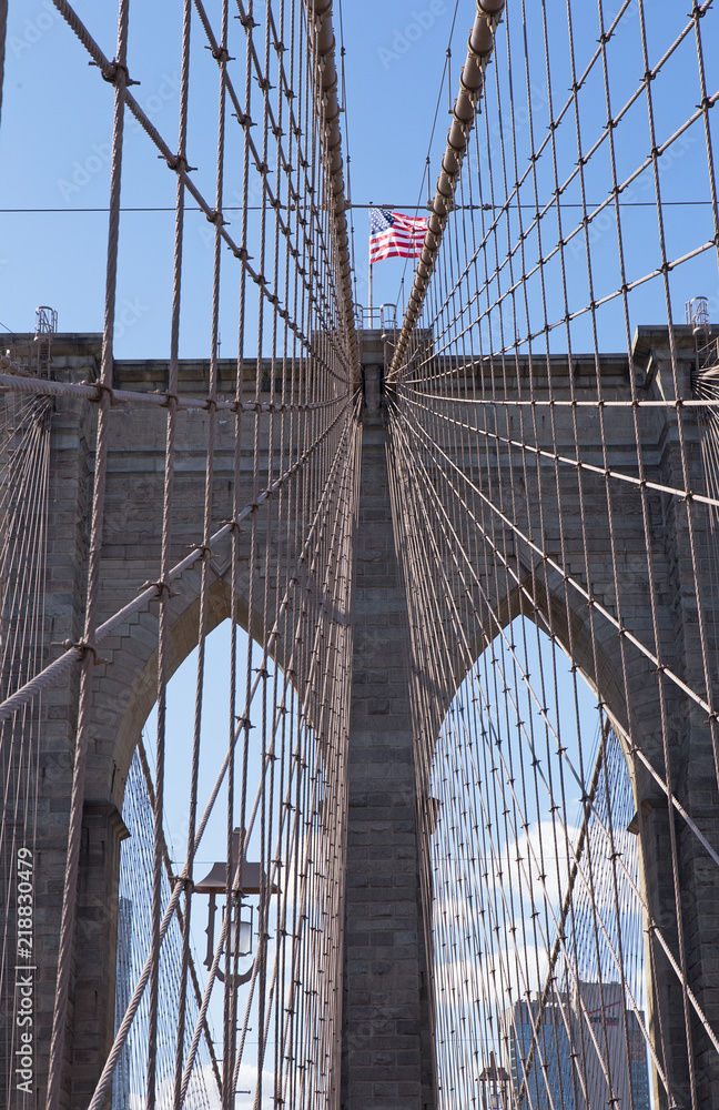 Fototapeta premium Brooklyn Bridge Archway and US Flag, New York