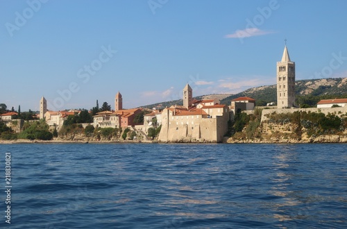 Panoramic view of the old town of Rab with the famous four clock towers. On Rab island, Croatia, South-East Europe. © utamaria