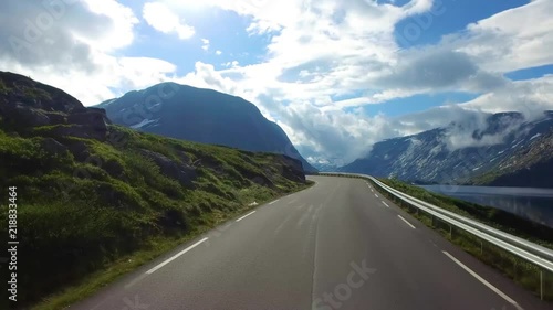 Driving a Car on a Road in Norway