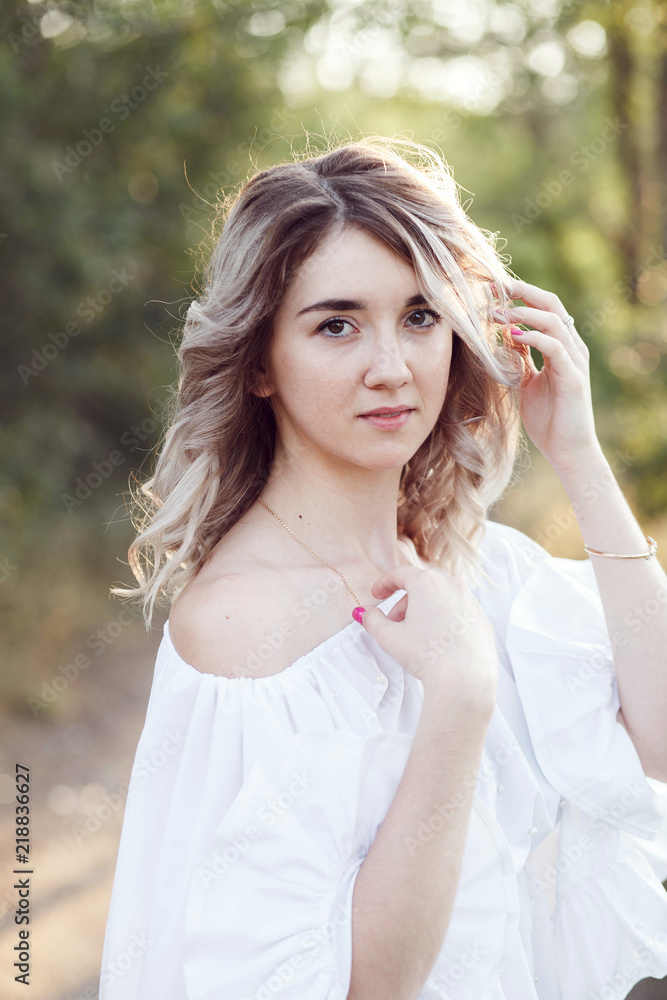 Beautiful Young Woman Outdoors. Enjoy Nature Beauty Girl Outdoor a Freedom nature concept Beautiful Young Woman Outdoors. Enjoy Nature Beauty Girl Outdoor a Freedom nature concept
